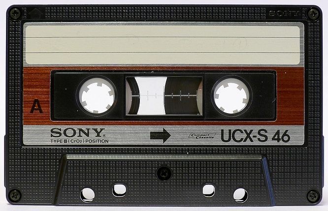 Black and brown cassette tape cover.